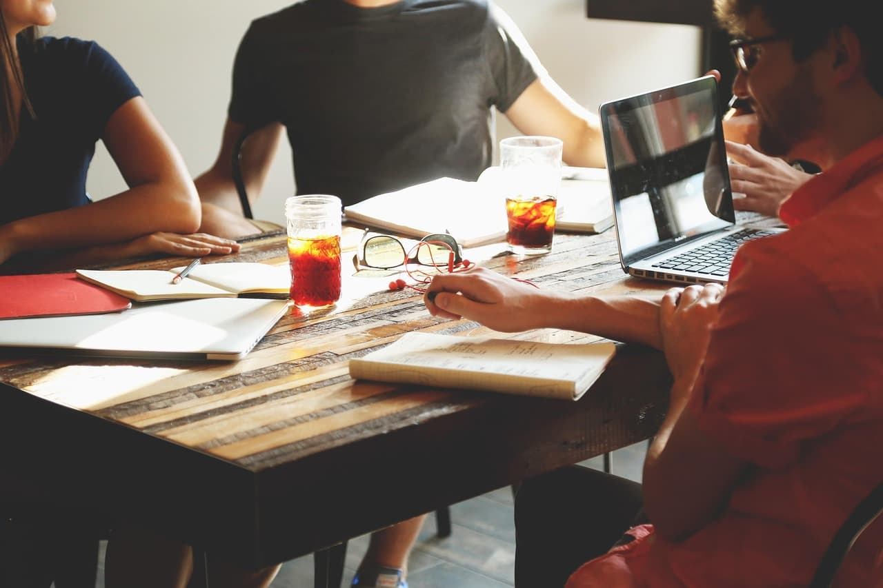 A community group meeting around a table